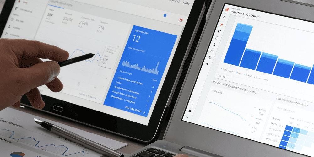Two computer screens showing Google Ads accounts