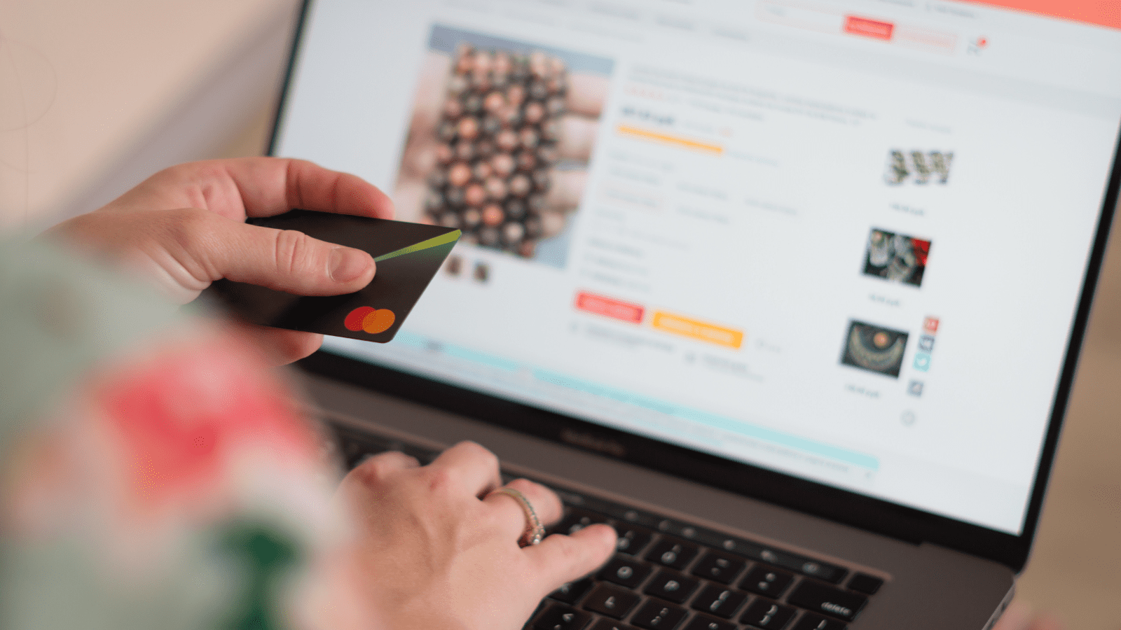 Amazon Sales Attribution How Non-Amazon Media Drives Sales & Why Unified ROAS Matters, consumer with laptop open to Amazon shopping site with credit card in hand